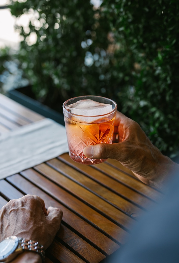 Aperitivo cocktail on the Heritage Rooftop restaurant terrace